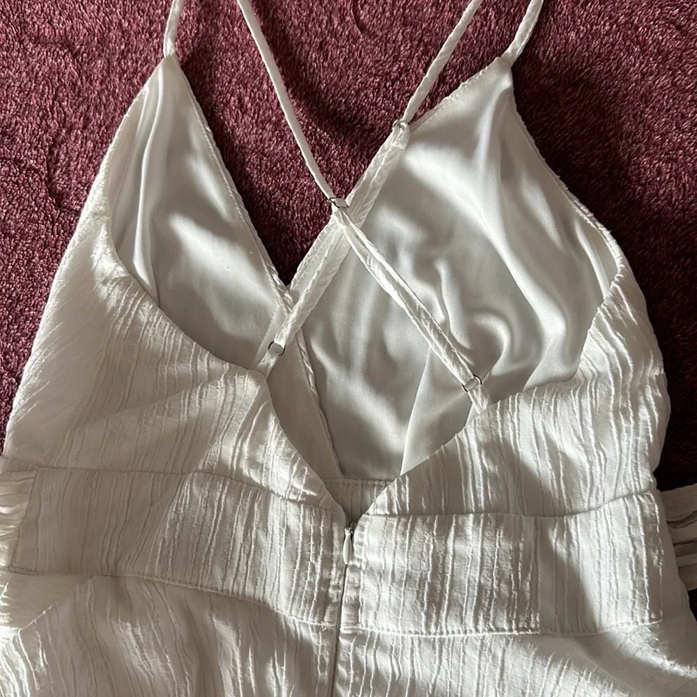 Short romper, jumpsuit, V cut at the top, crossed straps at the back - Picture 7 of 17